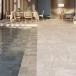 Espace extérieur moderne avec carrelage antiderapant et piscine, illustrant le choix d’un carrelage extérieur en PACA.